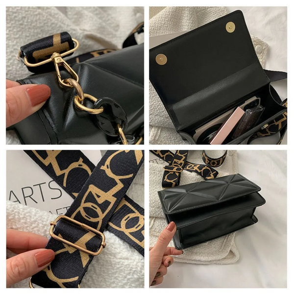 Zwarte leren schoudertas met goudkleurige ketting en verstelbare riem, opengeklapt met ruimte voor accessoires. Stijlvol en praktisch design.