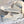 Witte canvas sneakers met blauwe accenten en gevlochten details, dikke zool, merk 