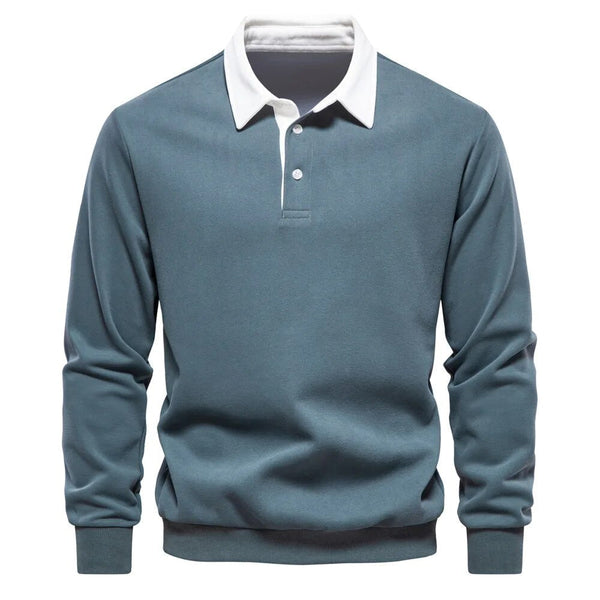 Blauwe herenpolo met lange mouwen en witte kraag, ideaal voor casual en zakelijke outfits. Comfortabele pasvorm, modieuze herenkleding.