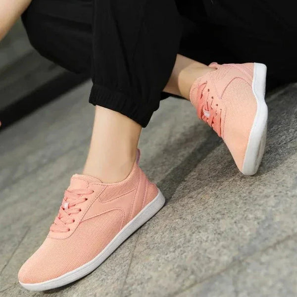 Roze dames sneakers, comfortabele sportieve schoenen met witte zolen, ideaal voor casual en sportieve outfits. Perfect voor dagelijks gebruik.