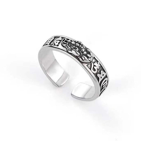 Zilveren verstelbare ring met Tibetaanse symbolen, boeddhistische sieraden, spirituele stijl, unisex ontwerp, handgemaakt, meditatie-accessoire.