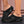 Zwarte ademende mesh slippers met verhoogde zool en luchtkussen, comfortabele instappers voor dames, mode en casual schoeisel.