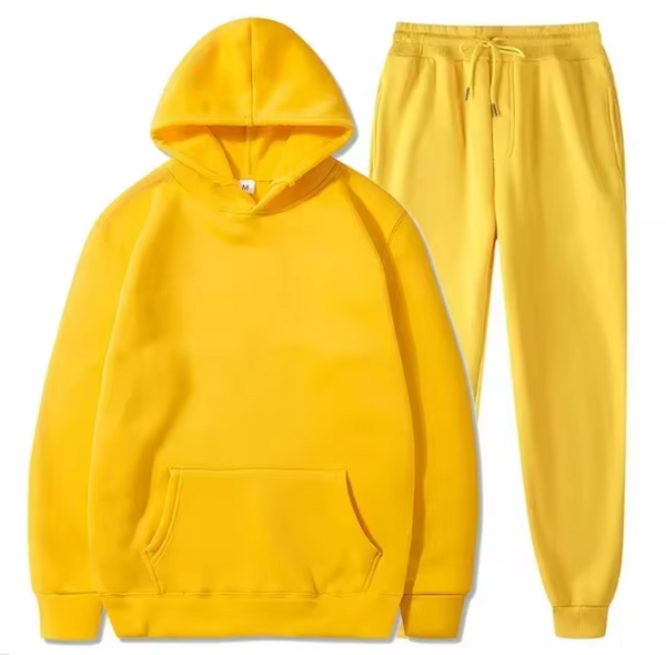 Gele hoodie en joggingbroek set, uniseks sportkleding, comfortabele katoenen stof, casual streetwear, perfect voor dagelijks gebruik.
