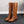 Bruine veterlaarzen voor dames, kniehoge mode met vierkante hak en rubberen zool. Trendy en comfortabel schoeisel voor dagelijks gebruik.
