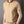 Beige herenpolo met korte mouwen en ritssluiting, gedragen door een man. Stijlvolle casual kleding, ideaal voor zomermode en comfort.