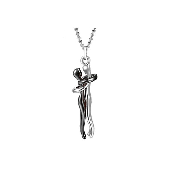 Zilveren ketting met abstracte hanger van omhelzend paar, elegant design, romantisch cadeau, sieraden voor geliefden, moderne stijl.