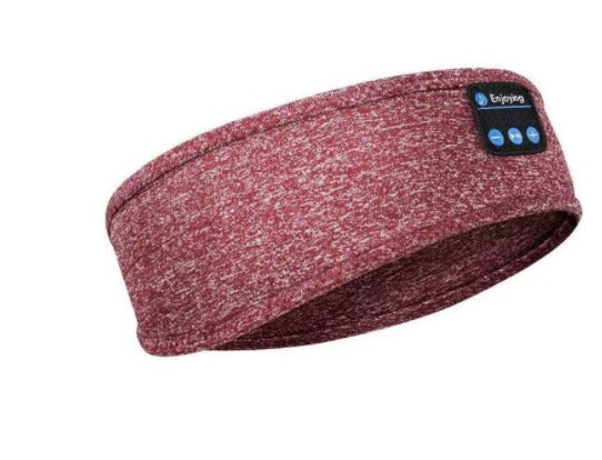 Roze slaapband met ingebouwde Bluetooth-hoofdtelefoon, ideaal voor comfortabel slapen en muziek luisteren. Perfect voor ontspanning en reizen.