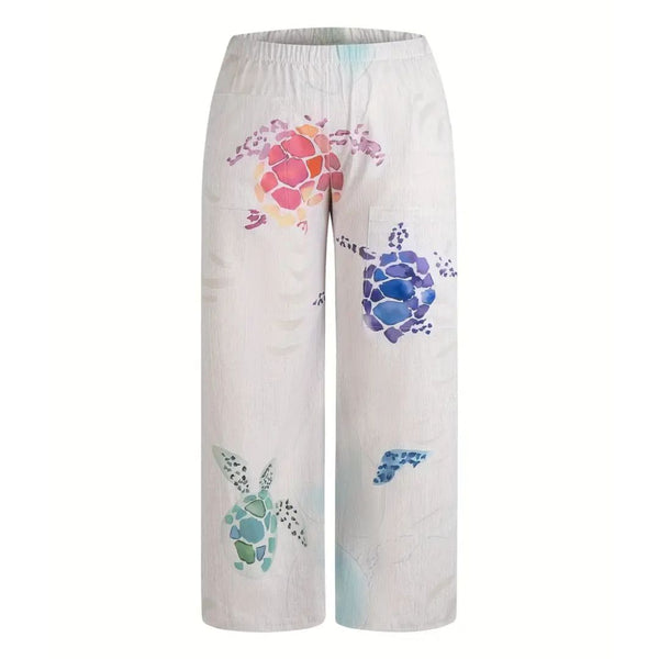 Witte broek met kleurrijke schildpadprint, damesmode, casual stijl, elastische tailleband, comfortabele pasvorm, trendy zomerbroek.