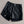 Zwarte leren dames short met zilveren gesp, modieuze hoge taille, perfect voor trendy zomeroutfits. Comfortabele pasvorm, stijlvol design.