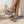 Dames sleehaksandalen in lichtblauw met gevlochten zool en metalen ringdetail, perfect voor zomerse outfits. Comfortabele en stijlvolle schoenen.