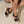 Zwarte dames sleehaksandalen met kurken zool en decoratieve gesp, gedragen op een gevlochten mat. Perfect voor zomerse mode en casual outfits.