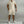 Zomerse heren trainingspak set: lichtbeige poloshirt met korte mouwen en sportshorts. Perfect voor casual en sportieve activiteiten.