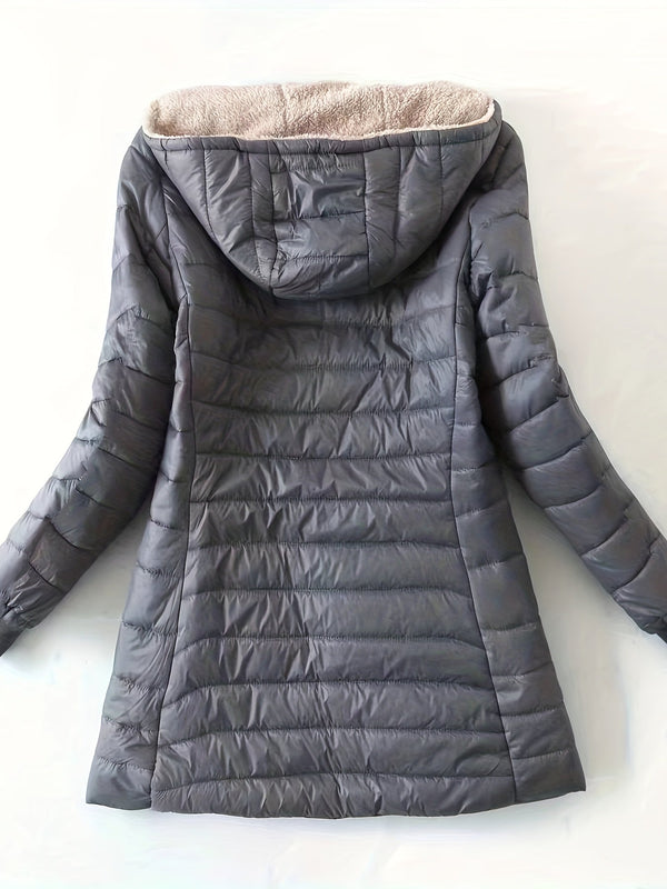 Donkergrijze gewatteerde winterjas met capuchon en zachte voering, ideaal voor dames. Stijlvolle en warme jas voor koude dagen.