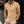 Beige herenpolo met korte mouwen, zwarte knoopsluiting en contrasterende kraag, gedragen door man. Stijlvolle casual herenkleding.
