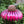 Roze metalen vogelvoeder in bloemvorm met vogel, tuinaccessoire, decoratieve voederbak, geschikt voor buitengebruik, trekt vogels aan.