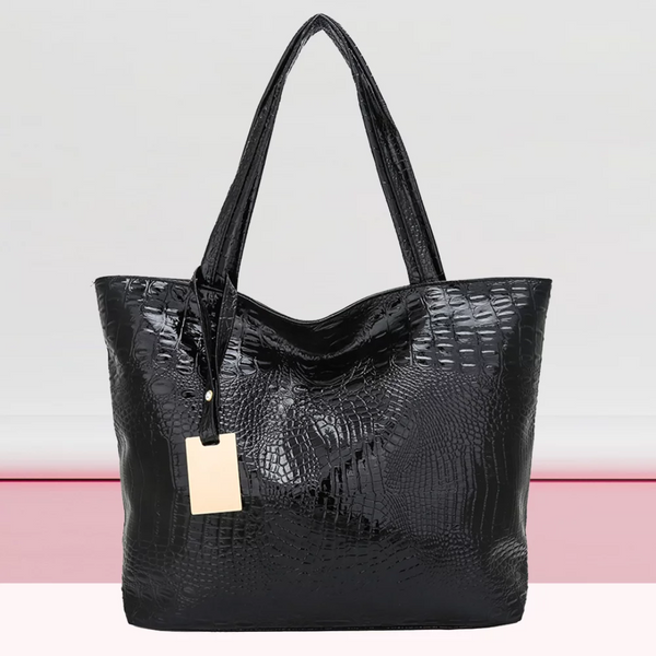 Zwarte krokodillenleren handtas met dubbele schouderbanden en goudkleurig label, stijlvolle damesaccessoire, ideaal voor dagelijks gebruik.