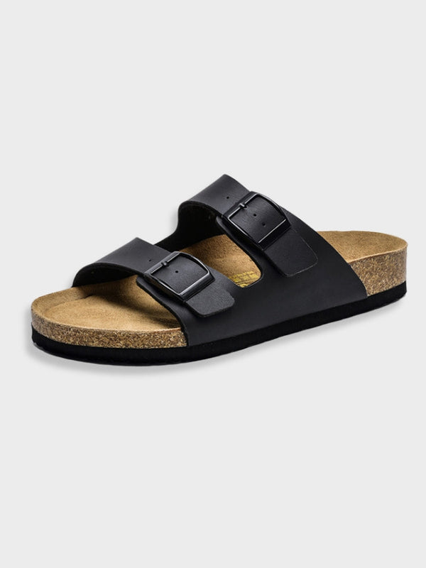 Zwarte leren sandaal met twee verstelbare gespen en kurken zool, ideaal voor comfort en casual stijl. Perfect voor zomerse wandelingen.