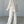Vrouw in beige ribgebreide loungewear set met wijde broek en oversized trui, casual mode, comfortabele kleding, minimalistisch design.