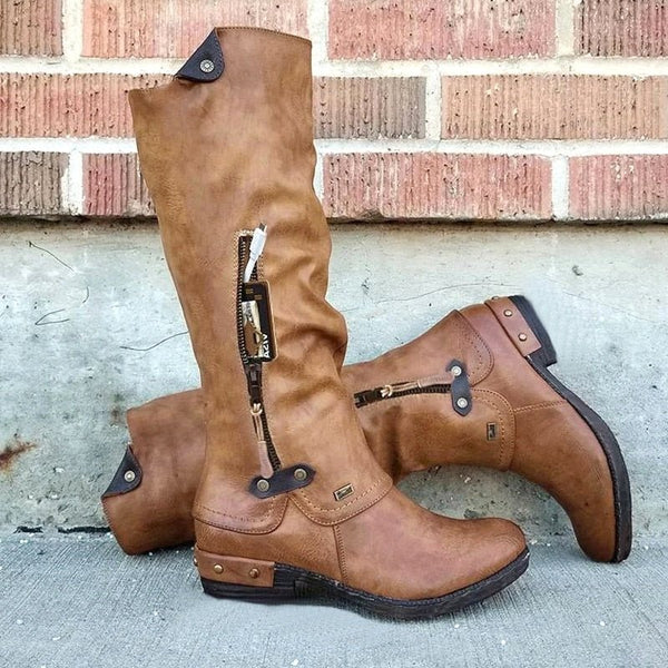 Bruine hoge laarzen met opbergruimte, ritssluiting en gespen, ideaal voor herfstmode. Stijlvolle dameslaarzen voor dagelijks gebruik.
