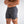 Grijze sportshorts voor heren met trekkoord en ritszak, ideaal voor fitness en training. Comfortabele pasvorm, ademend materiaal.