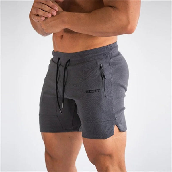 Grijze sportshorts voor heren met trekkoord en ritszak, ideaal voor fitness en training. Comfortabele pasvorm, ademend materiaal.