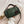 Groene leren handtas met bruine handvatten en rozenhanger, stijlvolle damesmodeaccessoire, perfect voor dagelijks gebruik en trendy outfits.