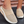 Beige ademende mesh instappers voor dames, comfortabele casual schoenen met elastische band en witte zool, ideaal voor dagelijks gebruik.