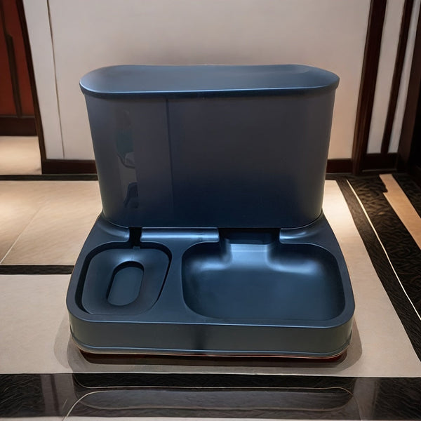 Donkerblauwe automatische kattenbak met dubbele compartimenten, modern design, geschikt voor kattenverzorging, hygiënisch en stijlvol interieur.