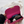 Roze handtas met gouden ketting, open met zichtbare inhoud: smartphone, portemonnee, flesje en witte doek. Stijlvolle damesaccessoire.