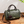 Groene leren handtas met bruine handvatten en rozenhanger, stijlvolle damesmodeaccessoire, perfect voor dagelijks gebruik en trendy outfits.