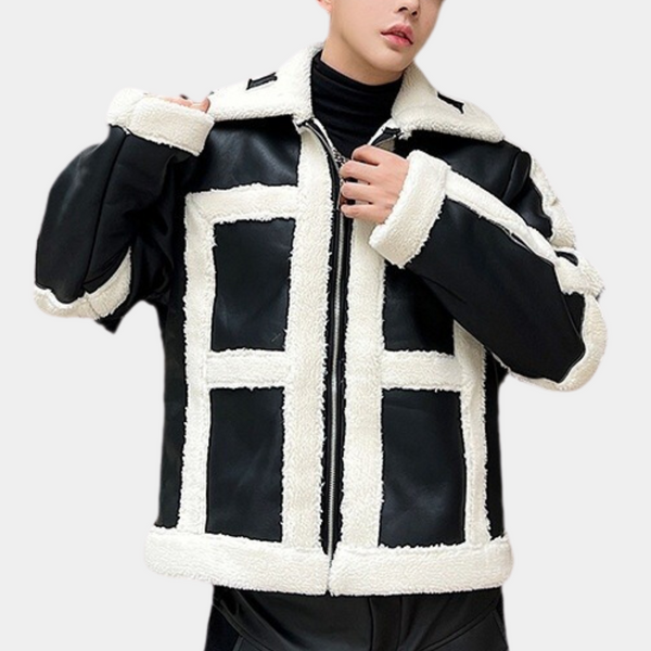 Zwart-witte shearling jas voor heren, wintermode, trendy design, warme voering, stijlvolle buitenkleding, perfecte keuze voor koude dagen.