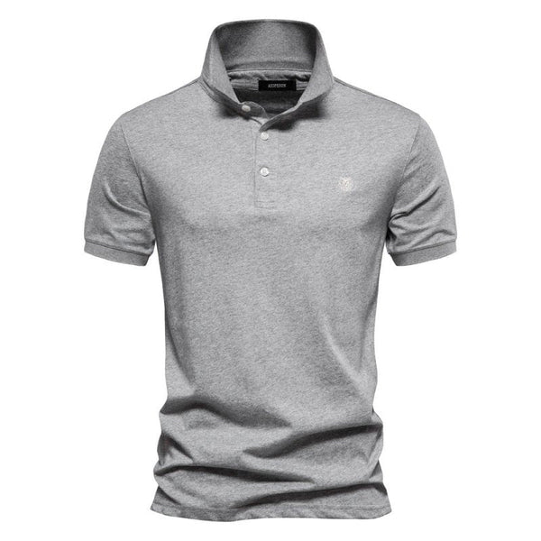 Grijze polo met korte mouwen, knoopsluiting en opstaande kraag. Casual herenkleding, ideaal voor dagelijks gebruik. Comfortabele pasvorm.
