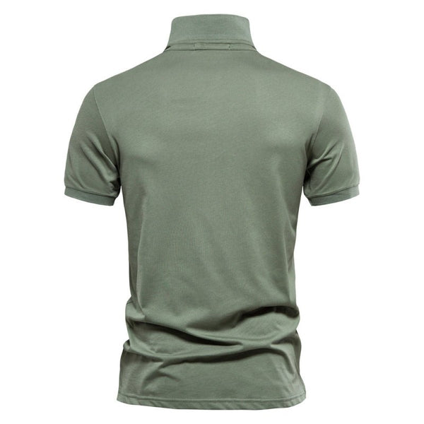 Groene herenpolo met korte mouwen, klassieke kraag en comfortabele pasvorm. Ideaal voor casual en zakelijke gelegenheden. Hoogwaardige kwaliteit.