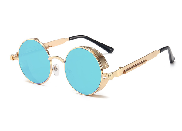 Ronde zonnebril met goudkleurig montuur en blauwe glazen, retro stijl, unisex design, modieuze accessoire voor zomer en festival.