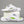 Witte unisex slippers met groene zool, modern design, ademend materiaal, ideaal voor zomer en strand. Comfortabele en stijlvolle sandalen.