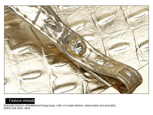 Gouden handtas met krokodillenprint en diamantdetail, luxe modeaccessoire, elegant ontwerp, perfect voor stijlvolle gelegenheden.