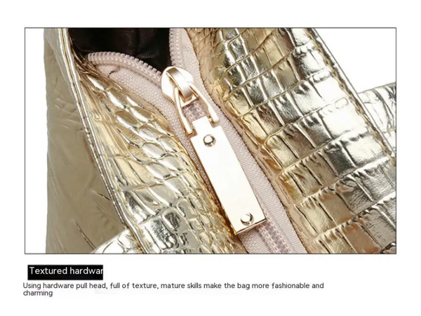 Gouden krokodillenleren tas met ritssluiting, luxe design, stijlvolle handtas, modieuze accessoires, hoogwaardige textuur, trendy damesmode.