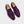 Paarse Italiaanse loafers van suède met kwastjes, houten schoenspanners, luxe herenschoenen, Florence stijl, op witte achtergrond.