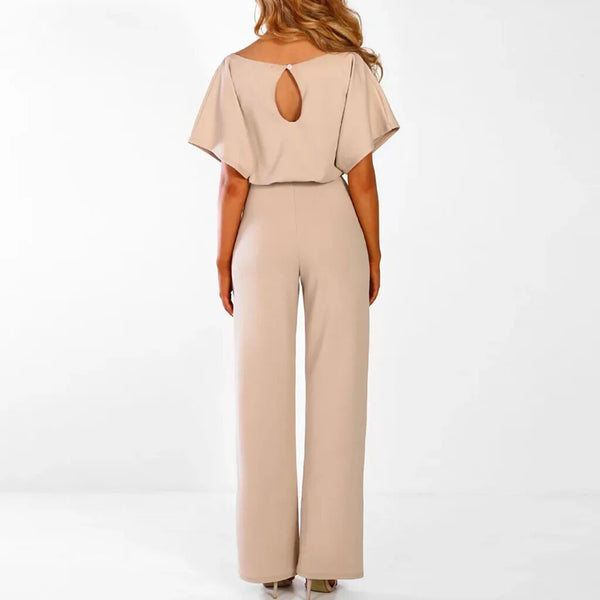 Elegante dames jumpsuit, beige, ronde hals, wijde pijpen, rugknoopdetail, geschikt voor zomerfeesten. Stijlvolle damesmode, trendy overalls.
