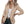 Vrouw in stijlvolle khaki blazer, witte top en donkere jeans. Modieuze dameskleding, casual chic outfit, trendy blazer voor dagelijks gebruik.
