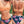 Oranje bikini top met gekruiste bandjes en bloemenprint bikini broekje, vrouwelijk badmode ontwerp, strandkleding, zomerstijl.