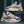 Moderne beige en blauwe sneakers met luchtkussenzool, merk Guo Chao. Stijlvolle sportschoenen voor heren, ideaal voor dagelijks gebruik en sportactiviteiten.