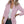 Vrouw in roze blazer, witte top en zwarte broek, draagt een handtas. Modieuze dameskleding, casual chic stijl, trendy outfit voor kantoor.
