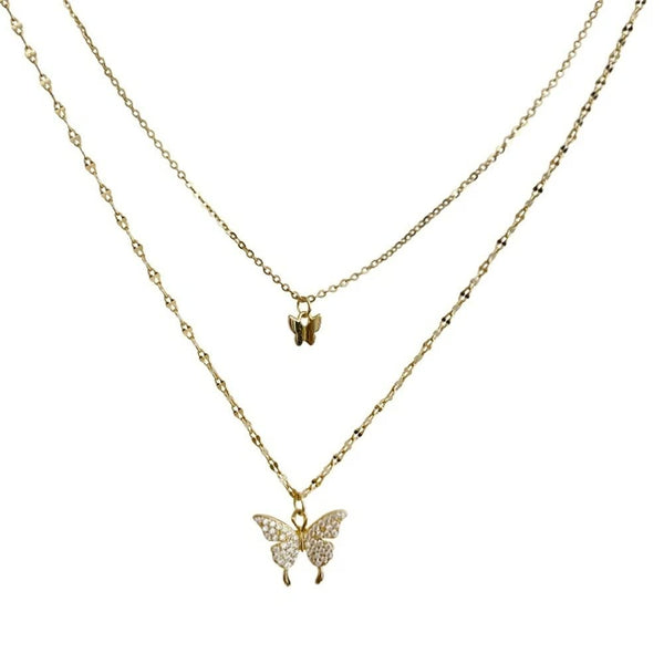 Gouden dubbele ketting met vlinderhanger, minimalistisch design, dames sieraden, modieuze accessoires, elegante stijl, perfect cadeau-idee.