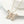 Gouden vlinderhanger ketting met kristallen op witte achtergrond, elegant sieraad, damesaccessoire, modieuze vlinderketting, cadeau-idee.