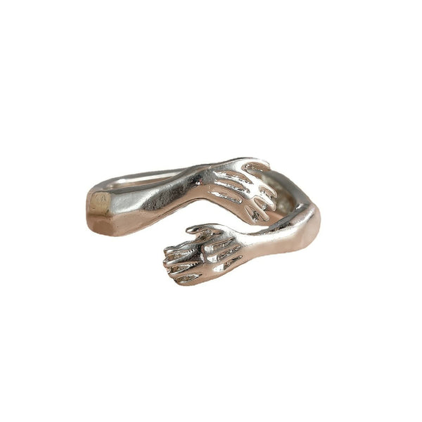 Zilveren ring met handontwerp, unieke sieraden, moderne stijl, handgemaakte accessoires, cadeau-idee, minimalistisch design, trendy modeaccessoire.