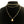Gouden ketting met ronde hanger en dubbele schakelketting op zwarte achtergrond. Stijlvolle damesaccessoire, perfect voor modieuze sieraden.
