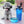 Grijze poedel met blauwe waterfles en opvouwbare kom op marmeren vloer, ideaal voor huisdieruitstapjes. Hond accessoires, draagbare drinkfles.