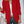 Vrouw in rode blazer met witte blouse en beige handtas, stijlvolle zakelijke outfit, mode voor dames, trendy kleding voor kantoor.