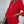 Vrouw in stijlvolle rode blazer, modieuze zakelijke outfit, trendy dameskleding, elegante jas, moderne kantoorlook, mode-accessoire.